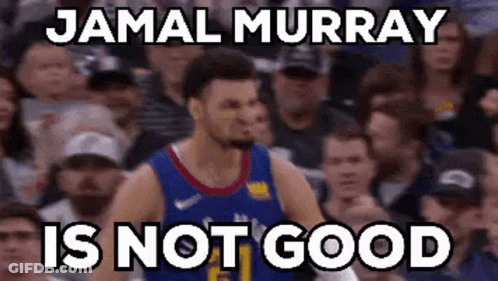 A Man In A Basketball Uniform Is Standing In Front Of A Crowd . GIF