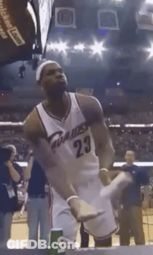 A Man In A Basketball Uniform With The Number 23 GIF