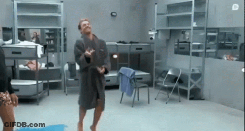 Man In Bathrobe Dancing In Room GIF