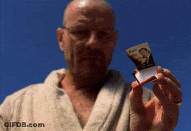 A Man In A Bathrobe Is Holding A Cigarette Pack With A Picture Of A Man On It GIF