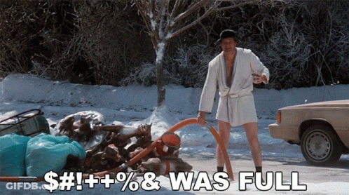 A Man In A Bathrobe Is Pumping Water From A Hose With The Words $ # ! + ! % & Was Full Written Below GIF