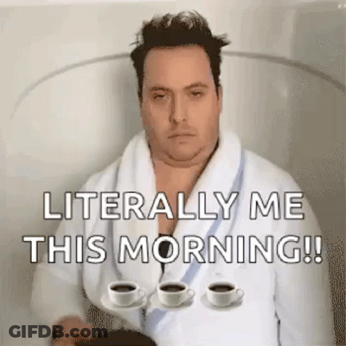 A Man In A Bathrobe Is Sitting In A Bathtub With Two Cups Of Coffee . GIF