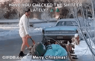 A Man In A Bathrobe Is Standing In The Snow Next To A Car And A Pile Of Trash . GIF