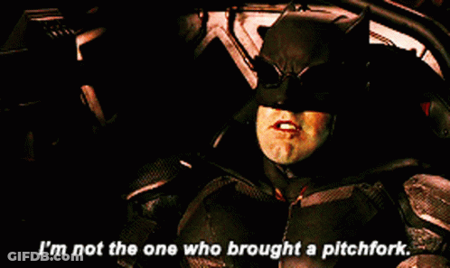 A Man In A Batman Costume Is Saying I 'M Not The One Who Brought A Pitchfork GIF
