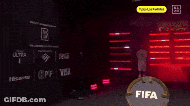 A Man In A Bayern Munchen Jersey Is Walking GIF