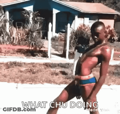 A Man In A Bikini Is Standing On A Sidewalk In Front Of A House And Says `` What Chu Doing '' . GIF