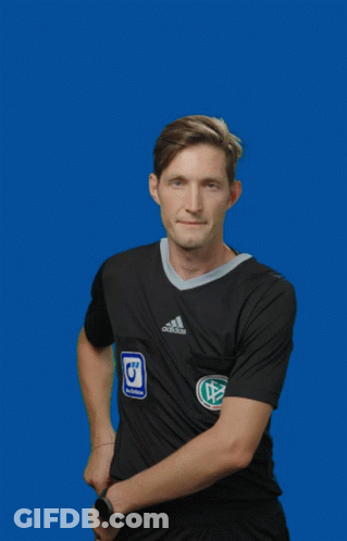 A Man In A Black Adidas Shirt Holds Up A Red Card GIF