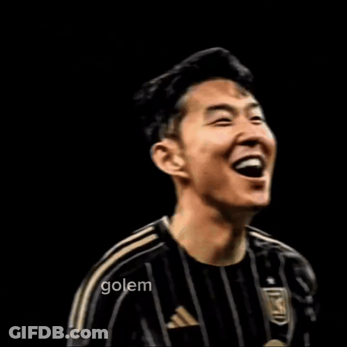 A Man In A Black And Gold Striped Shirt With The Word Son On It GIF