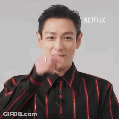 A Man In A Black And Red Striped Shirt With Netflix Written On The Bottom Right GIF