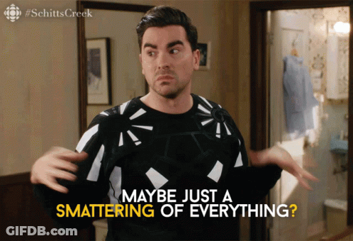 A Man In A Black And White Sweater Says Maybe Just A Smattering Of Everything GIF