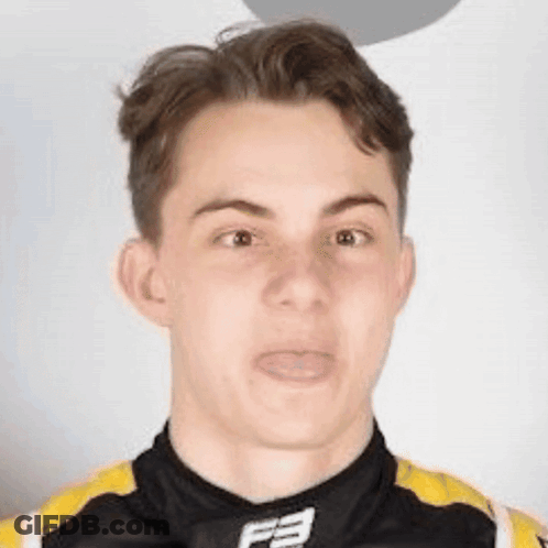 A Man In A Black And Yellow Shirt With The Letter F On It GIF