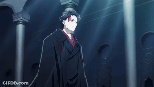 A Man In A Black Cape And Red Kimono Stands In A Dark Room GIF