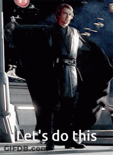 A Man In A Black Cape Is Standing In Front Of A Sign That Says " Let 'S Do This " GIF