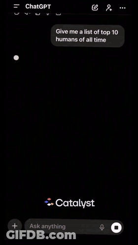 A Man In A Black Coat Is Standing In The Snow With A Catalyst Logo In The Lower Right Corner GIF