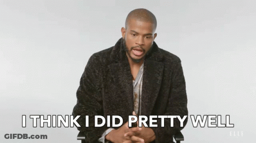A Man In A Black Coat Says " I Think I Did Pretty Well " In Front Of A White Background GIF