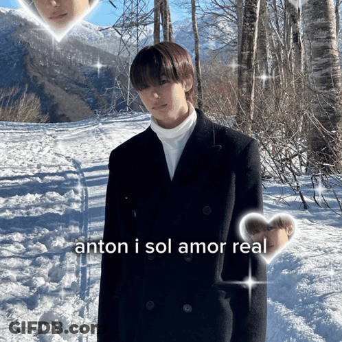 Man In Black Coat In Snow With Anton I Sol Amor Real GIF
