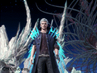 A Man In A Black Coat With Blue Wings Is Standing In Front Of A Dragon GIF