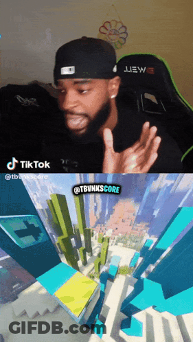 A Man In A Black Hat Is Talking Next To A Screenshot Of A Video Game GIF