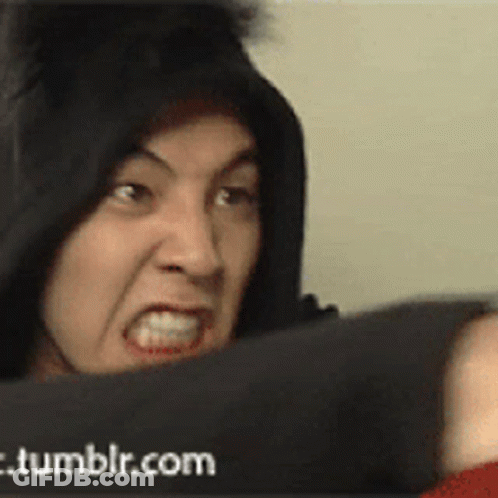 A Man In A Black Hoodie Is Making A Funny Face In Front Of A Tumblr.com Banner GIF