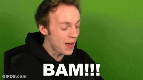 A Man In A Black Hoodie Is Sitting In Front Of A Green Screen And Says Bam ! GIF