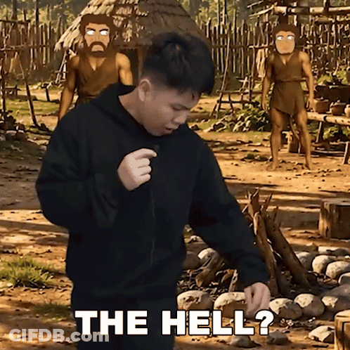A Man In A Black Hoodie Is Standing In A Dirt Field And Says The Hell GIF