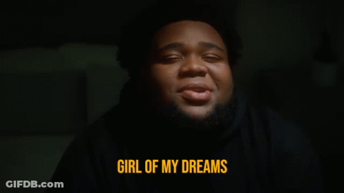 A Man In A Black Hoodie Says Girl Of My Dreams In Yellow Letters GIF