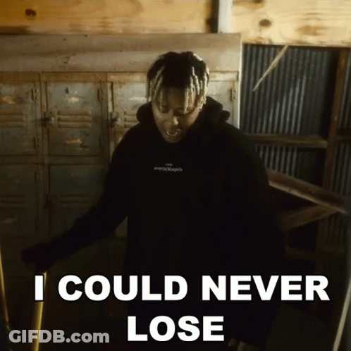 A Man In A Black Hoodie Says " I Could Never Lose " While Standing In A Room GIF