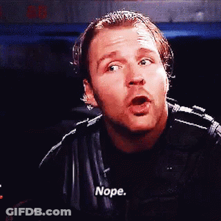 A Man In A Black Jacket Is Making A Funny Face And Saying Nope GIF