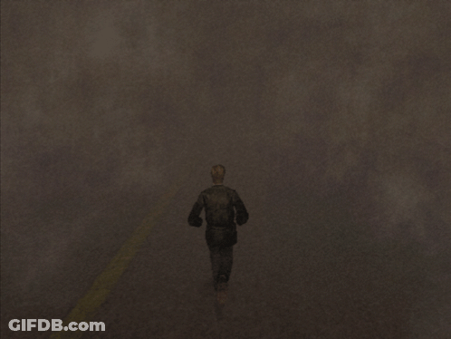 A Man In A Black Jacket Is Running In A Dark Room GIF