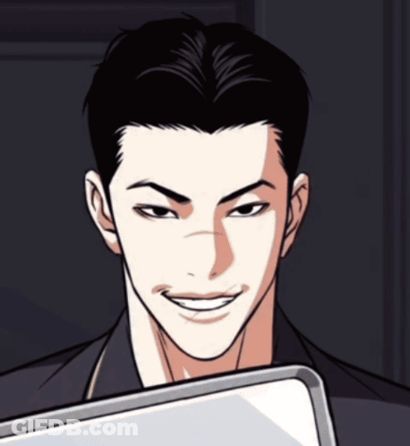 A Man In A Black Jacket Is Smiling And Holding A White Board GIF