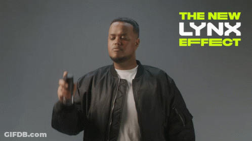 A Man In A Black Jacket Is Spraying Something With The New Lynx Effect Written On The Bottom GIF