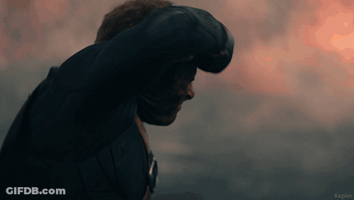 A Man In A Black Jacket Is Standing In Front Of A Cloudy Sky With Kepler Written On The Bottom GIF