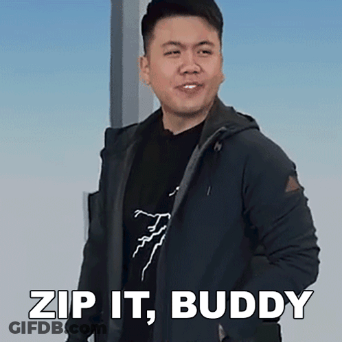 A Man In A Black Jacket Is Standing In Front Of A Sign That Says " Zip It Buddy " GIF
