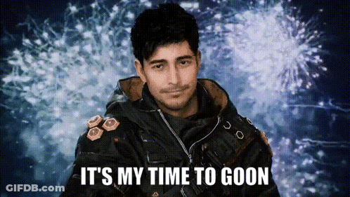 A Man In A Black Jacket Says It 'S My Time To Goon In Front Of Fireworks GIF