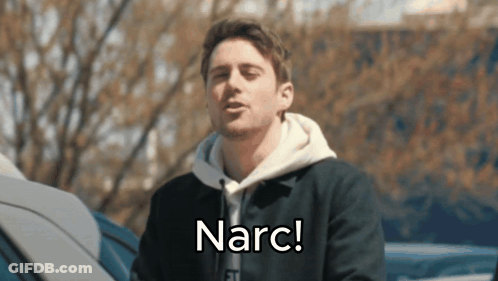 A Man In A Black Jacket Says Narc GIF
