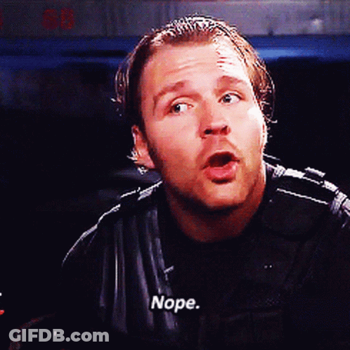 A Man In A Black Jacket Says Nope In White Letters GIF