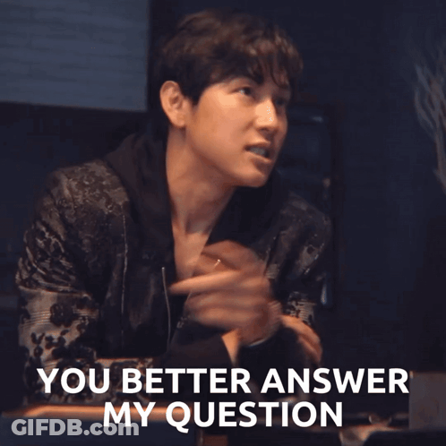 A Man In A Black Jacket Says " You Better Answer My Question " While Pointing At Something GIF