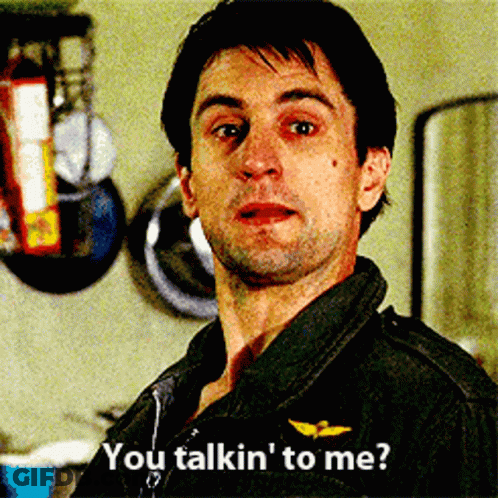 A Man In A Black Jacket Says " You Talkin ' To Me " In A Kitchen GIF
