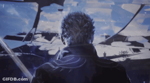 A Man In A Black Jacket Stands In Front Of A Broken Glass Wall GIF