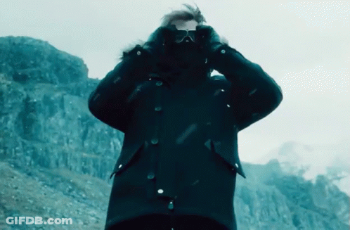 A Man In A Black Jacket Takes A Picture Of Himself GIF