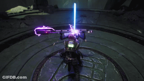 A Man In A Black Jacket With The Word Lucas On The Back Is Holding A Lightsaber GIF