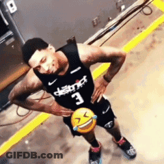 A Man In A Black Jersey With The Number 3 On It Holds A Smiley Face GIF