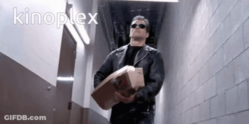 A Man In A Black Leather Jacket Is Carrying A Bag Of Mcdonald 'S Chicken GIF