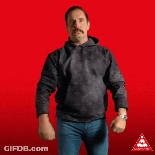 A Man In A Black Louis Vuitton Hoodie Is Dancing GIF