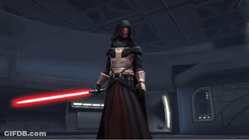 A Man In A Black Robe Holding A Red Light Saber GIF