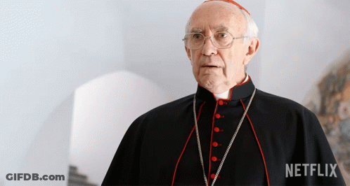 A Man In A Black Robe With Red Buttons And A Netflix Logo In The Corner GIF