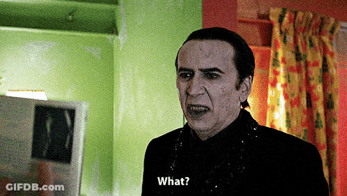 A Man In A Black Shirt Is Asking What GIF