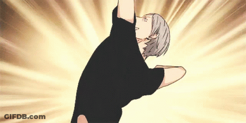 A Man In A Black Shirt Is Doing A Handstand GIF