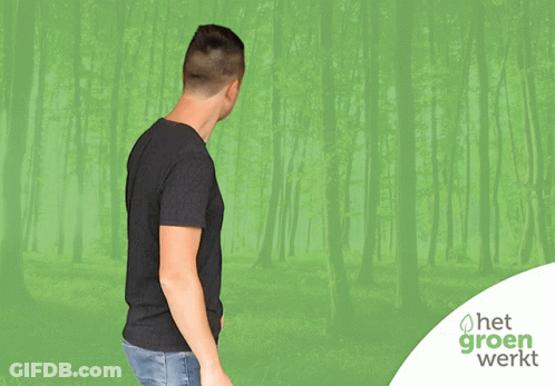 A Man In A Black Shirt Is Giving An Ok Sign GIF
