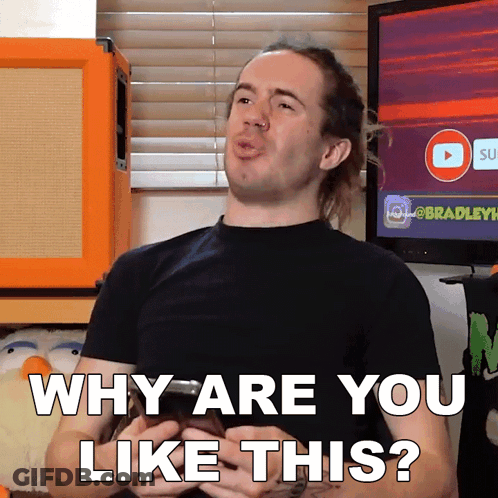 A Man In A Black Shirt Is Holding A Cell Phone And Says Why Are You Like This GIF